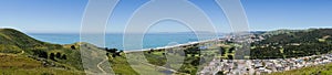 Panoramic view of Pacifica coastline as seen from the top of Mori Point, Marin County in the background, California