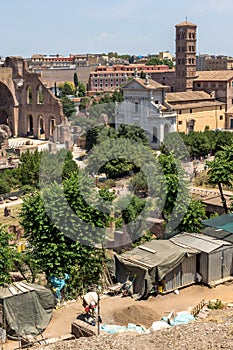 Panoramic view from Palatine Hill to ruins of Roman Forum in city of Rome, Italy