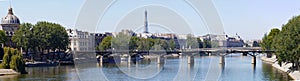 Panoramic view of Paris with Pont des Arts and the Eiffel tower
