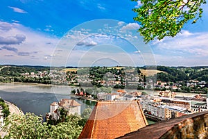 Panoramic view of Passau. Aerial skyline of old town from Veste Oberhaus castle . Confluence of three rivers Danube, Inn