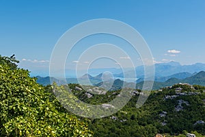 Panoramic view at Pavlova Strana on the river of Crnojevi?a flowing through green lands to Lake Skadar