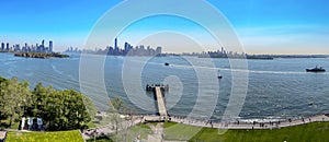 Panoramic view from the pedestal of the Statue of Liberty of the New York City skyline.
