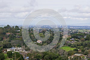 Panoramic view of the Peninsula on a cloudy day; view towards Los Altos, Palo Alto, Menlo Park, Silicon Valley and Dumbarton