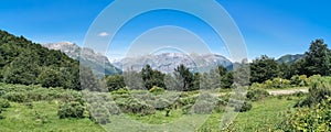 Panoramic view at the Picos de Europa, or Peaks of Europe, a mountain range extending for about 20 km, forming part of the photo