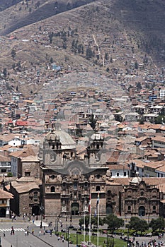 Panoramic view of plaza de armas and a catholic church facade