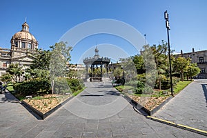 Panoramic view of the Plaza de Armas with a metal kiosk in background