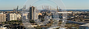 Panoramic view of the `Poblados Maritimos` neighborhood of Valencia Spain with the commercial port in the background full of con photo