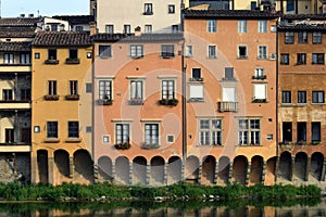 Panoramic view of Ponte Vecchio with river Arno at sunset, Florence, Italy