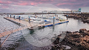 Panoramic view of the port of Orzala, with sports boats, north of Lanzarote, Canary Islands