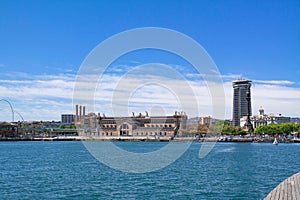 Panoramic view of the Port Vell with the building of the State Agency for Tax Administration in the middle and Columbus Monument photo