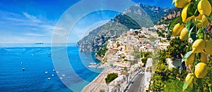 Panoramic view of Positano with comfortable beaches and blue sea on Amalfi Coast in Campania, Italy. Amalfi coast is popular