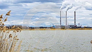 Panoramic view of power station Lukomlskaya Gres. Chimneys with smoke of power plant