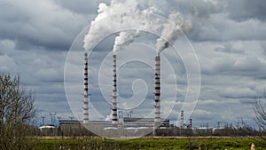 Panoramic view of power station Lukomlskaya Gres. Chimneys with smoke of power plant.