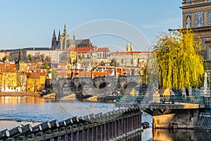 Panoramic view of Prague Castle, Charles Bridge and Vltava River from Novotny Foot-bridge. Prague, Czech Republic photo