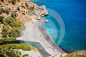 Panoramic View of Preveli Beach and Palm Tree Forest, Crete, Greece where the River Meats the Sea. Summer in Greek Islands