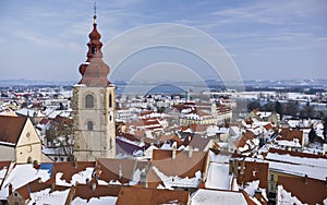 Panoramic view from Ptuj Castle over Drava river with snow