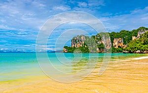 Panoramic view of Railay beach Krabi, Thailand. Beautiful tropical paradise with fresh blue water, hot sand and limestone rock