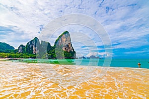 Panoramic view of Railay beach Krabi, Thailand. Beautiful tropical paradise with fresh blue water, hot sand and limestone rock