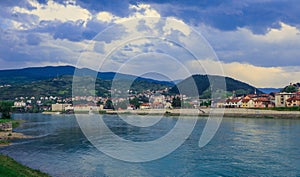 Panoramic View in the Rainy Day to the  ViÅ¡egrad with the Rainbow over the Drina River,