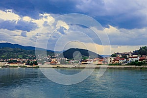 Panoramic View in the Rainy Day to the  ViÅ¡egrad with the Rainbow over the Drina River,