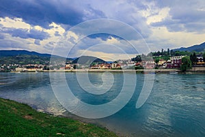 Panoramic View in the Rainy Day to the  ViÅ¡egrad with the Rainbow over the Drina River,