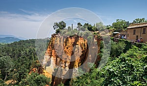 Panoramic view of red ocher cliffs around village of Roussillon, Provence