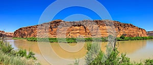 Panoramic view red rock hill eroded by Colorado river