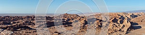 Panoramic view of the red rock and salt formations of the Valle de la Luna, Valley of the Moon, in the Atacama Desert