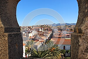 Panoramic view of red tile roofs and white walls buildings