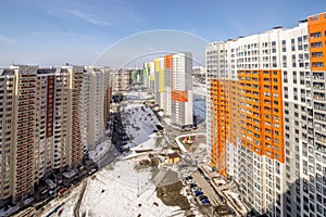 Panoramic view of residential multi-storey buildings in Moscow with streets and yards