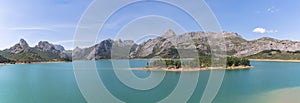 Panoramic view at the RiaÃ±o Reservoir, located on Picos de Europa or Peaks of Europe, a mountain range forming part of the photo