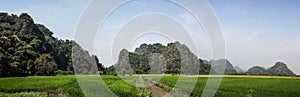 Panoramic view of the rice paddies and kartisc formations outside the sadan cave, Hpa-an, Hpa-an District, Myanmar