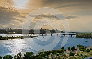Panoramic view of the right bank of Kiev. Dnieper river, evening and sunset. Metro bridge. Sight. Nice view from the