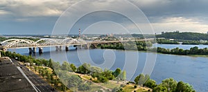 Panoramic view of the right bank of Kiev. Dnieper river, evening and sunset. Metro bridge. Sight. Nice view from the