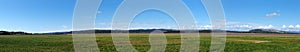 Panoramic view of the river kent near arnside and sandside in cumbria with surrounding lakeland hills