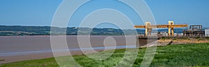 Panoramic view of the River Severn and loading quay heavy lift crane of Oldbury Power Station