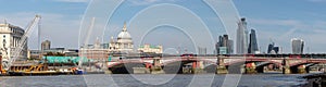 London, UK - Panoramic View of the River Thames, Blackfriars Bridge, Saint Paul`s Cathedral and London Skyscrapers photo