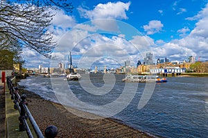 Panoramic view of the River Thames from Rotherhithe Promenade with views of Tower Bridge, London skyscrapers such as The Shard, photo
