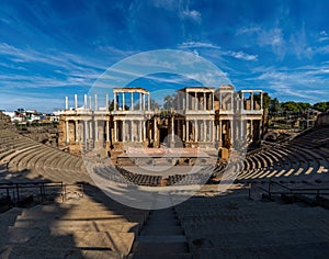 Panoramic view of the Roman Theater of Merida with the scaffolding, spotlights, stage and chairs placed under the stands prepared