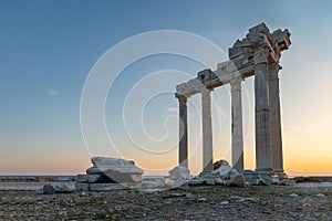 Panoramic view of ruins of ancient Temple of Apollo in Side at sunrise, Alanya province, Turkey. Ruined old city. Unesco