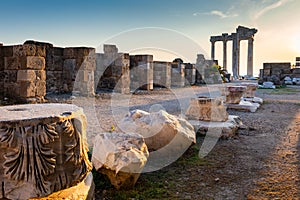 Panoramic view of ruins of ancient Temple of Apollo in Side on sunset, Alanya province, Turkey. Ruined old city. Unesco