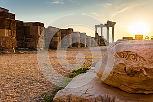 Panoramic view of ruins of ancient Temple of Apollo in Side on sunset, Alanya province, Turkey. Ruined old city. Unesco