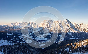 Panoramic view Saalbach hinterglemm steinernes Meer leogang sunset snowy mountains alps blue sky