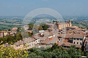 Panoramic view and Sant Agostino church at San Gimignano photo