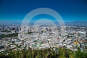 Panoramic view of Santiago de Chile city from San Cristobal hill point of view
