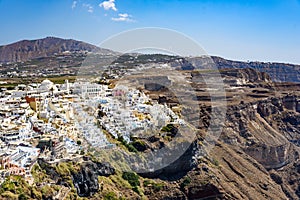 Panoramic view of Santorini island village and Thira town