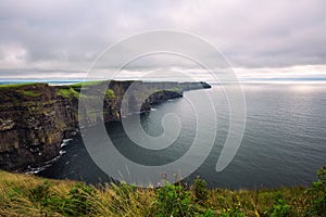 Panoramic view of the scenic Cliffs of Moher in Ireland