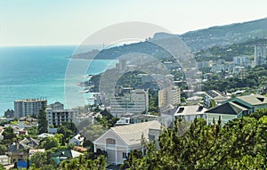 Panoramic view of the sea coast with hotels and buildings, top view, southern coast of Crimea