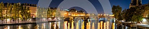 Panoramic view on the Seine River banks, the Pont Royal bridge, and Orsay Museum at dawn. Paris, 7th Arrondissement, France photo