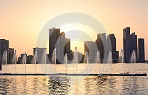 Panoramic view of Sharjah waterfront in UAE at sunset